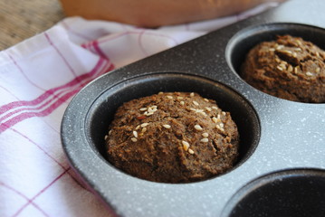 Buckwheat muffins sprinkled with Sesame and Flax seeds. Gluten-free. Close up view.