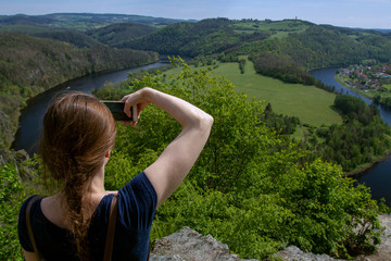 Naklejka premium Wooden statue of the Hindu god Ganesha. Hindu god of wisdom and prosperity.