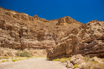 wilderness picturesque sand stone desert canyon landscape scenic view bare rocks and narrow pass...