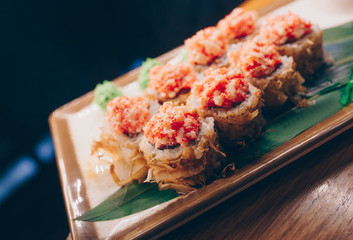 Large set of Sushi Rolls Warm Ebi Sake Unagi Spring. A lot assortment Philadelphia roll Dishes from Japanese raw fish  in one plate in traditional restaurant. Japan food menu service