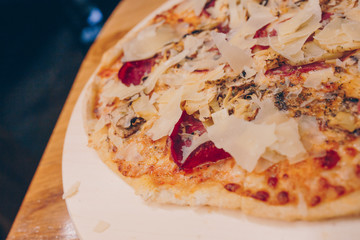 Close-Up Pepperoni Pizza bacon barbeque pizza cheese, salami, Tomatoes, pepper, Spices and Fresh Basil. Italian pizza at restaurant  Eating and leisure concept.lifestyle Organic Gourmet Concept banner