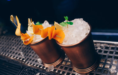 Sweet Famous white with caramels decoration slice  Author inspired Cocktail Drink - on bar counter . Close-up Top view . Copy paste space for design people and luxury service barman in nightclub