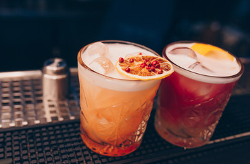 Sweet Famous white with caramels decoration slice  Author inspired Cocktail Drink - on bar counter . Close-up Top view . Copy paste space for design people and luxury service barman in nightclub