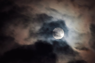 Naklejka na ściany i meble A full moon in the cloud. Supermoon