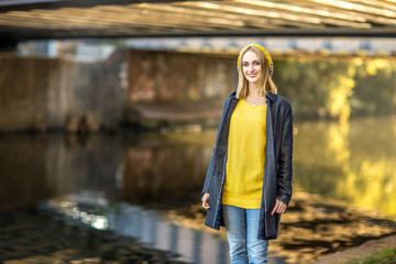 young woman by the river