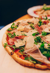 Close-Up Pizza bacon barbeque pizza cheese, salami, Tomatoes, pepper, Spices and Fresh Basil. Italian pizza at restaurant  Eating and leisure concept.lifestyle Organic Gourmet Concept banner