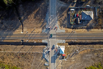 The railway crossing through which passing cars