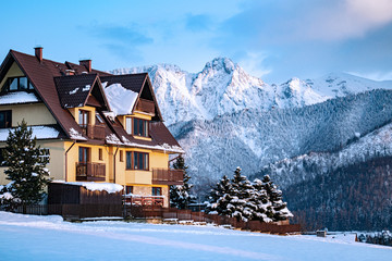 Tatra Mountains - Giewont, Czerwone Wierchy, regle - winter panoramic view with clouds, snow,...