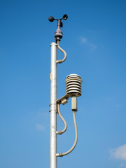 Wind flow meter With a sky background texture