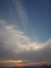 sunset with blue sky ,clouds and rddishness