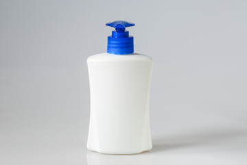 White liquid soap plastic bottle isolated on white