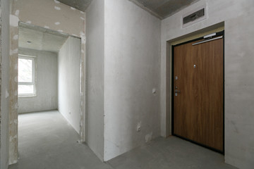 interior of the apartment without decoration in gray colors