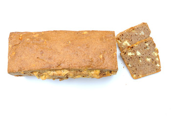 Homemade healthy bread made with spelt, gouda cheese and yeast, bread is imperfect but homemade and on a white background, the cheese is clearly visible within the bread