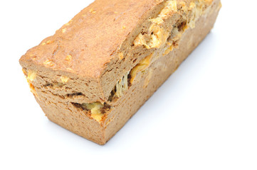Homemade healthy bread made with spelt, gouda cheese and yeast, bread is imperfect but homemade and on a white background, the cheese is clearly visible within the bread