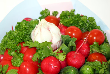Food grown in a greenhouse garden. Seasonal vegetables.