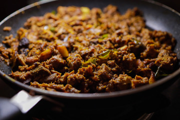 South Indian dish spicy beef fry Kerala, India. side dish ghee rice, appam, parotta, puttu, bread...