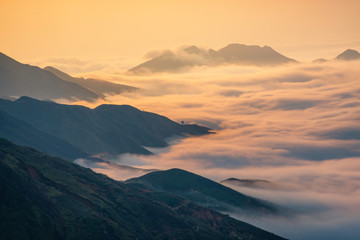 Ta Xua is a famous mountain range in northern Vietnam. All year round, the mountain rises above the clouds creating cloud inversions.
