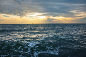 Obraz premium Not a calm sea.Sea with waves and picturesque clouds