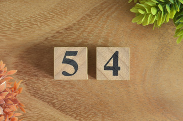 Number 54, Rating, Award, Design with number cube colorful stone in natural concept.