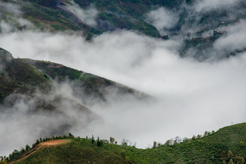 Ta Xua is a famous mountain range in northern Vietnam. All year round, the mountain rises above the clouds creating cloud inversions.