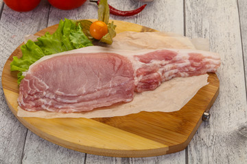 Raw pork bacon