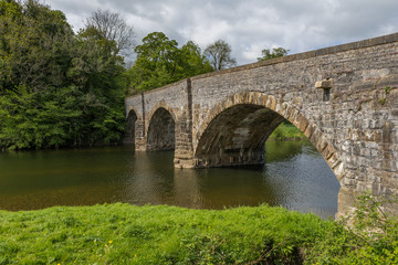 Fototapeta na wymiar Brungerley bridge, Clitheroe. Large stone bridge over the river Ribble