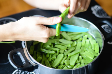 Collection of photographs cooking green beans.