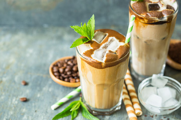 Iced latte coffee in a tall glass
