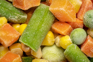 closeup background and texture of frozen vegetable medley