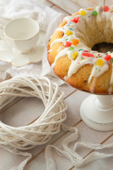 Cake Babka with icing and decoration, vintage pastel image