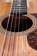 Obraz premium Close up of brown wooden classical guitar