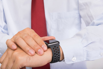 Businessman use smartwatch to contact business