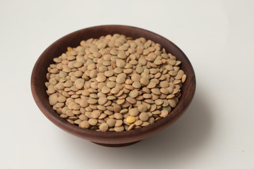Pile of raw lentil in a bowl