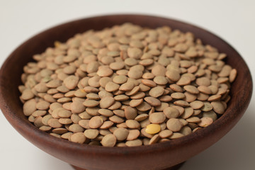 Pile of raw lentil in a bowl