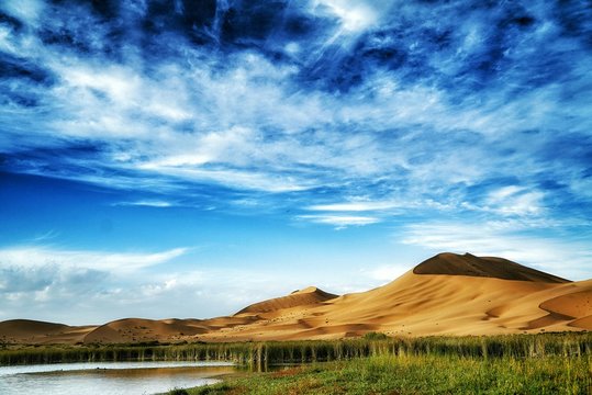 Scenic View Of Badain Jaran Desert Against Sky