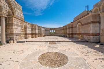 Obraz premium Pliska, Bulgaria and the The Great Basilica - largest Christian cathedral in medieval Europe near The capital city of the First Bulgarian Empire. 