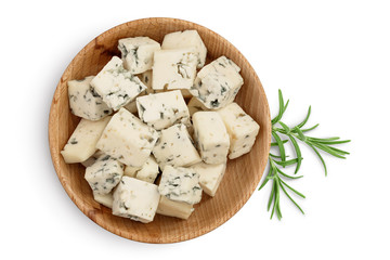 diced Blue cheese in wooden bowl isolated on white background with clipping path and full depth of field. Top view. Flat lay.