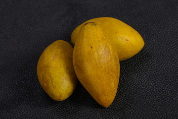 Exotic tropical fruit - Sapodilla in the plate