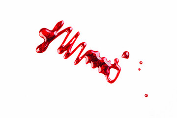 Spilled red nail polish on a white background