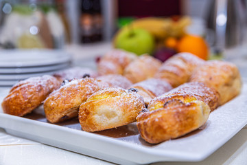 Delicious tasty fresh bakery products on table. Closeup