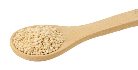 white quinoa seeds in wooden spoon isolated on white background with clipping path and full depth of field.