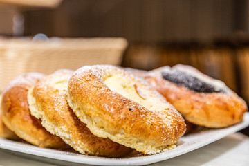 Delicious tasty fresh bakery products on table. Closeup