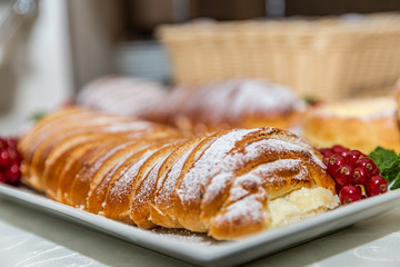 Delicious tasty fresh bakery products on table. Closeup