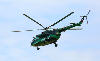 Fototapeta na wymiar Walking helicopter in the sky, St. Petersburg, Russia, July 2018