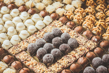 wedding Sweeties and candies with chocolate and nuts placed on a table