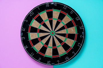 Obraz premium target dart board on the table, center point, head to target marketing and business success concept