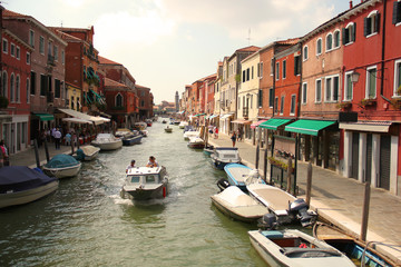 Naklejka na ściany i meble Venice Italy - buildings by riverside
