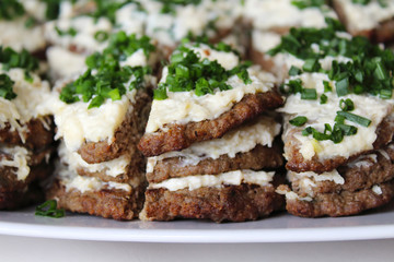 Liver pie with garlic and mayonnaise. Close-up. Background.