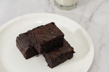 The group of homemade Chocolate Brownies on the white background - Copy Space