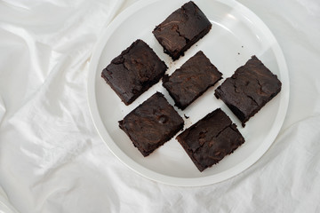 The group of homemade Chocolate Brownies on the white background - Copy Space